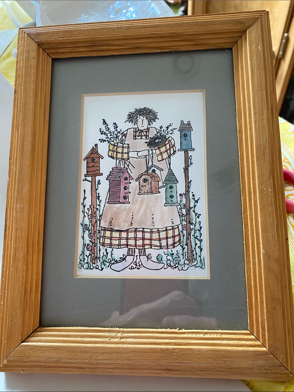 “Birdhouse Lady” by Linda Spivey. Wood Framed with Grey Border. 8.75x6.5 in. GUC